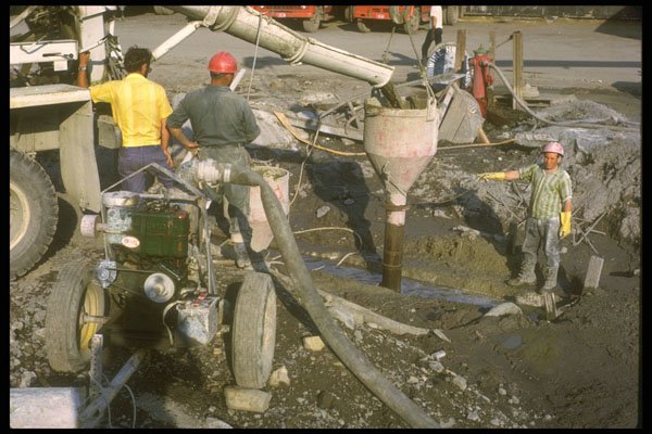237026 Pouring Concrete Into In ground Retaining Wall A4 Photo Print