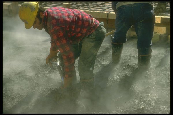 237029 Laborer Spreading Fresh Cement A4 Photo Print