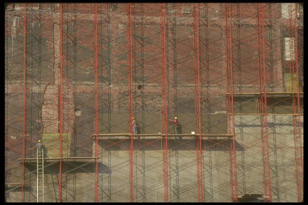 237048 Refinishing Brick Wall On Transformed Building A4 Photo Print