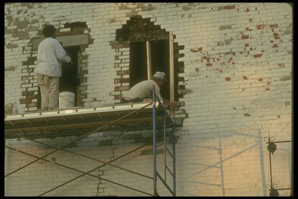 237063 Bricklayers Forming New Frames In Old Brick Wall A4 Photo Print