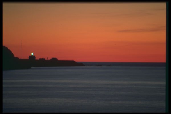 243003 Lighthouse At Sunset A4 Photo Print