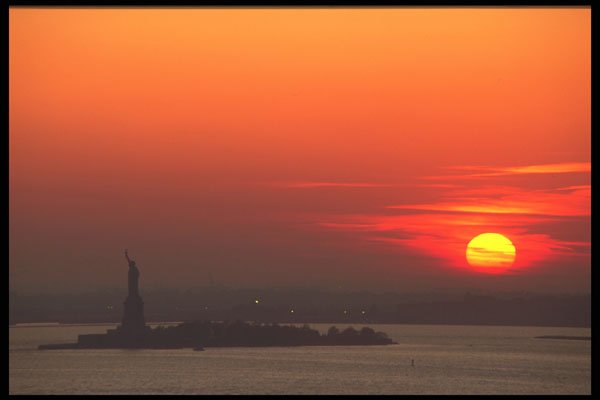 244093 Liberty Island With Sunset A4 Photo Print