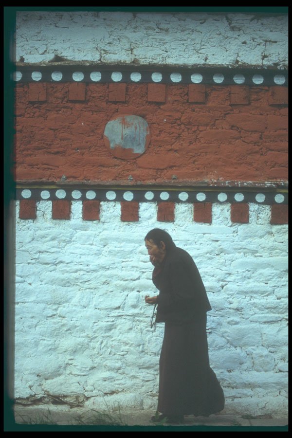 246012 Old Woman Circumambulates Jampey Lhakang A4 Photo Print