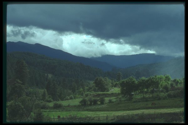 246039 Rain Clouds Move Over Bumthang A4 Photo Print