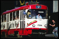 248064 Catching The Tram A4 Photo Print