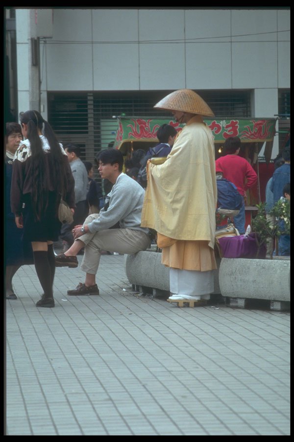 249021 Buddhist Monk Begging At Nara Station A4 Photo Print