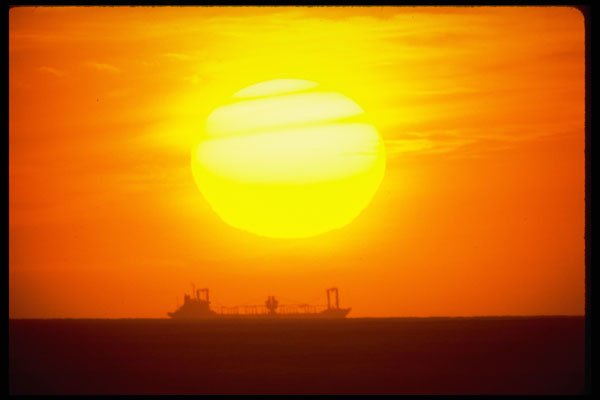 250081 Freighter At Sunset A4 Photo Print