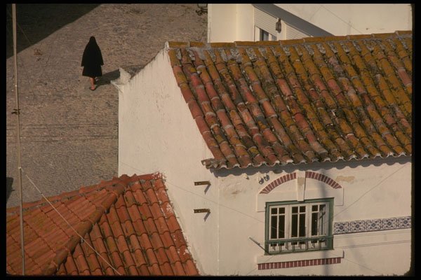 256067 Woman In Nazare's Cobblestone Streets A4 Photo Print