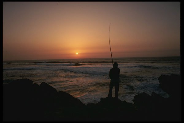 256099 Fishing From Cliffs Of Guincho A4 Photo Print