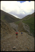 267097 Hikers Walking Through Valley A4 Photo Print