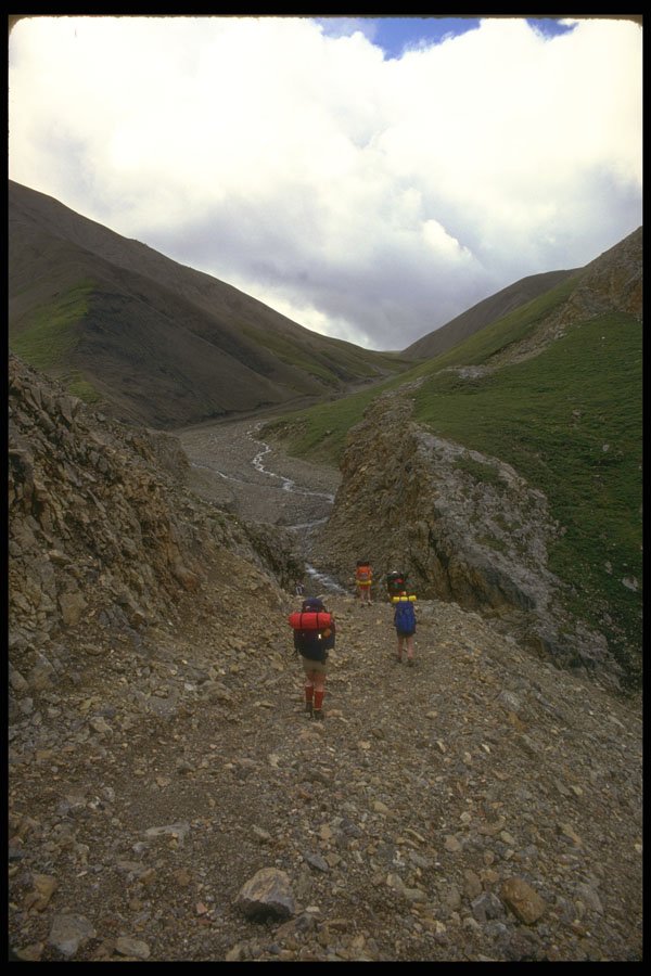 267097 Hikers Walking Through Valley A4 Photo Print