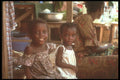 271014 Young Girls At Mother's Stand, Niger A4 Photo Print