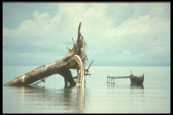 272079 Village Canoe, Low Tide A4 Photo Print