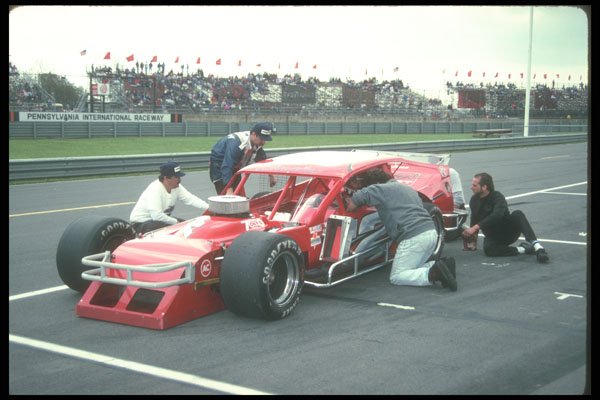 273028 A NASCAR Modified Driver Gets Pointers From His Crew Chief A4 Photo Print