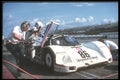273032 A Sports Car Team Makes Changes During A Pit Stop A4 Photo Print