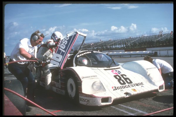 273032 A Sports Car Team Makes Changes During A Pit Stop A4 Photo Print