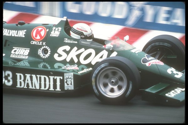 273037 An Indy Car Driver Hustles His Car Through A Tight Turn A4 Photo Print