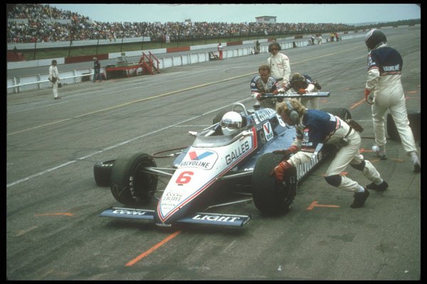 273042 Crew Members Help An Indy Car Driver Exit The Pits A4 Photo Print