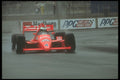 273048 An Indy Car On Rain Tires Fights For Traction In A Turn A4 Photo Print