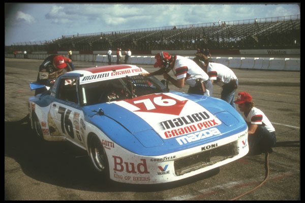273056 A Sports Racing Car Makes A Pit Stop A4 Photo Print
