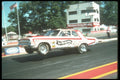 273079 A Super Stock Dodge Pulls The Wheels Coming Off The Line A4 Photo Print