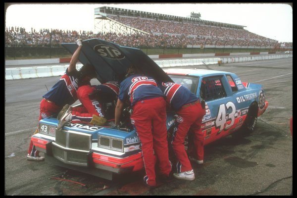 273094 The Petty Pit Crew Tries To Solve An Engine Problem A4 Photo Print