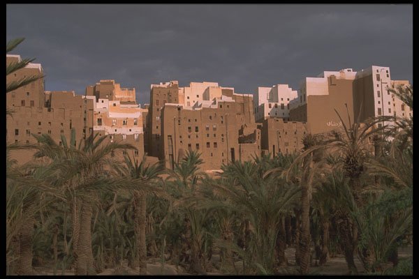 290011 The Whitewashed Tops Contrast With The Dark Sky, Shibam A4 Photo Print