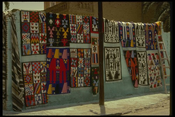 293049 Tunisia, Carpets For Sale On A Wall A4 Photo Print