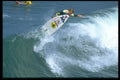 300070 Getting air at a California beach break A4 Photo Print