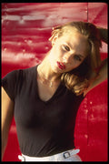 302077 Black Top Against Red Background A4 Photo Print