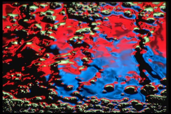 313013 Blue, Green, Red Neon Light Reflecting On Wet Asphalt A4 Photo Print
