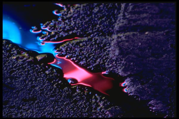 313040 Blue & Red Neon Light Reflected In Crack On Wet Asphalt A4 Photo Print