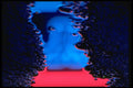 313055 Blue & Red Neon Light Reflected In Pool Of Rain Water A4 Photo Print