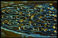 313062 Amber & Blue Light Reflected Off Wet Manhole Cover A4 Photo Print
