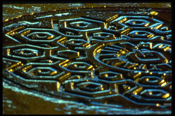 313062 Amber & Blue Light Reflected Off Wet Manhole Cover A4 Photo Print
