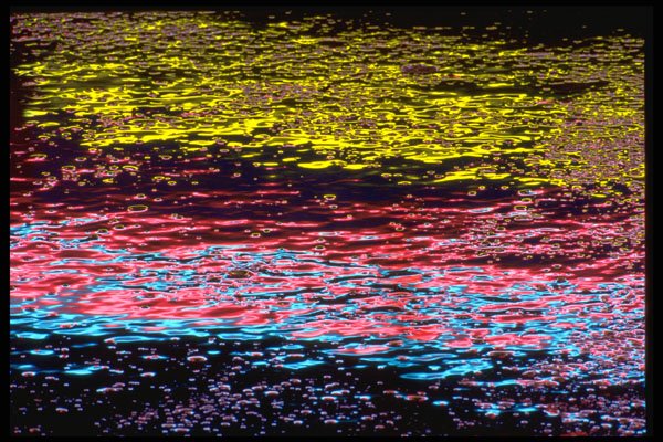 313066 Yellow, Red, Blue Neon Light Reflected Off Wet Asphalt A4 Photo Print