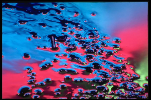 313083 Red, Blue, Green Neon Light Reflected On Wet Asphalt A4 Photo Print