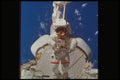 323058 Astronaut In Space A4 Photo Print