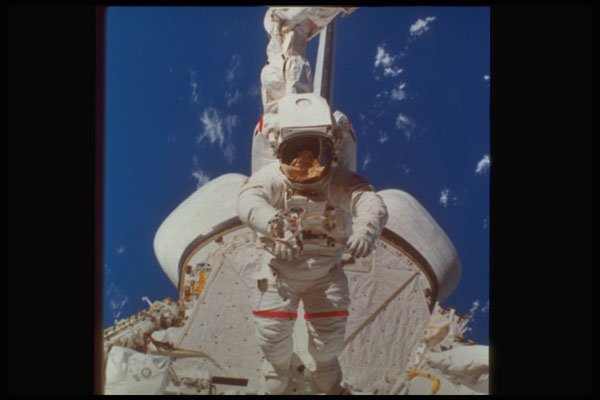 323058 Astronaut In Space A4 Photo Print