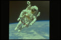 323062 Astronaut In Space A4 Photo Print