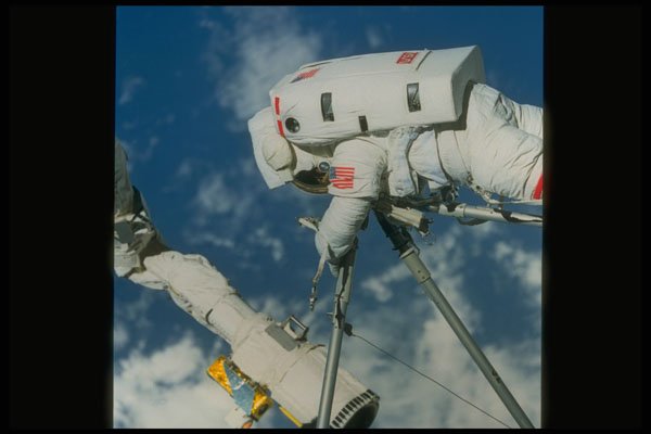 323063 Astronaut In Space A4 Photo Print