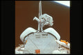 323083 Astronaut Uses Arm A4 Photo Print