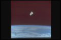 323085 Astronaut Over Earth A4 Photo Print