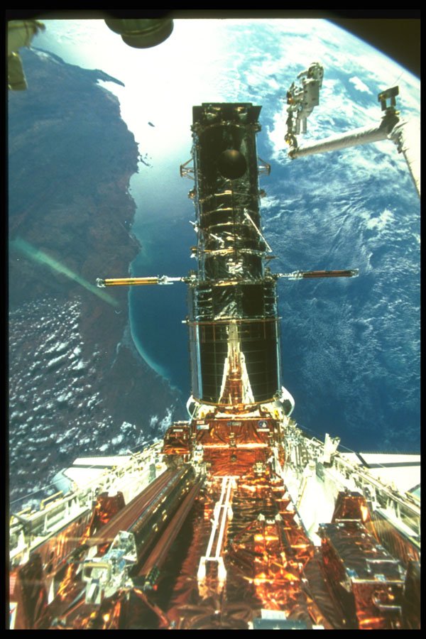 323091 HST Over Earth A4 Photo Print
