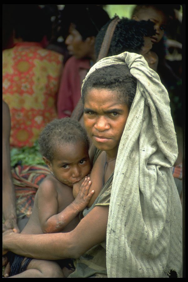 330025 Woman Nursing Child A4 Photo Print