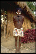 330078 Villager In Boxer Shorts A4 Photo Print