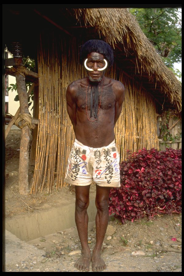 330078 Villager In Boxer Shorts A4 Photo Print