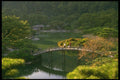 334084 Takamatsu Ritsurin Park, Central Bridge With Travellers A4 Photo Print