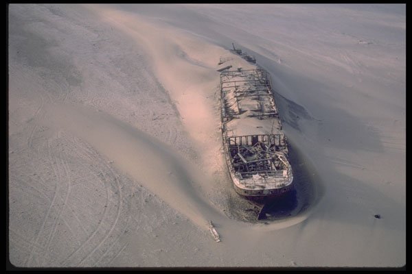 335048 Ghostly Vessel Run Onto The Dunes A4 Photo Print