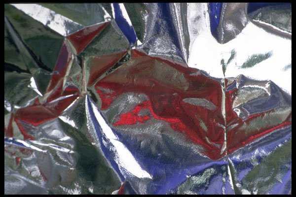 343005 Red, Green And Blue On Wrinkled Silver Reflector A4 Photo Print